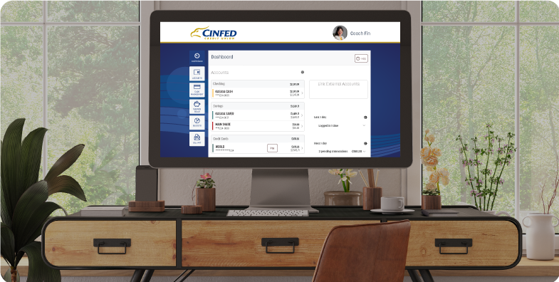 Laptop computer showing Cinfed Digital Banking account.